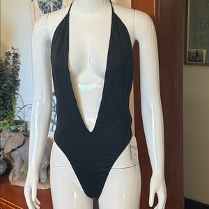 Plunge Halter Swimsuit with snaps at bottom to also wear out with jeans.size Med